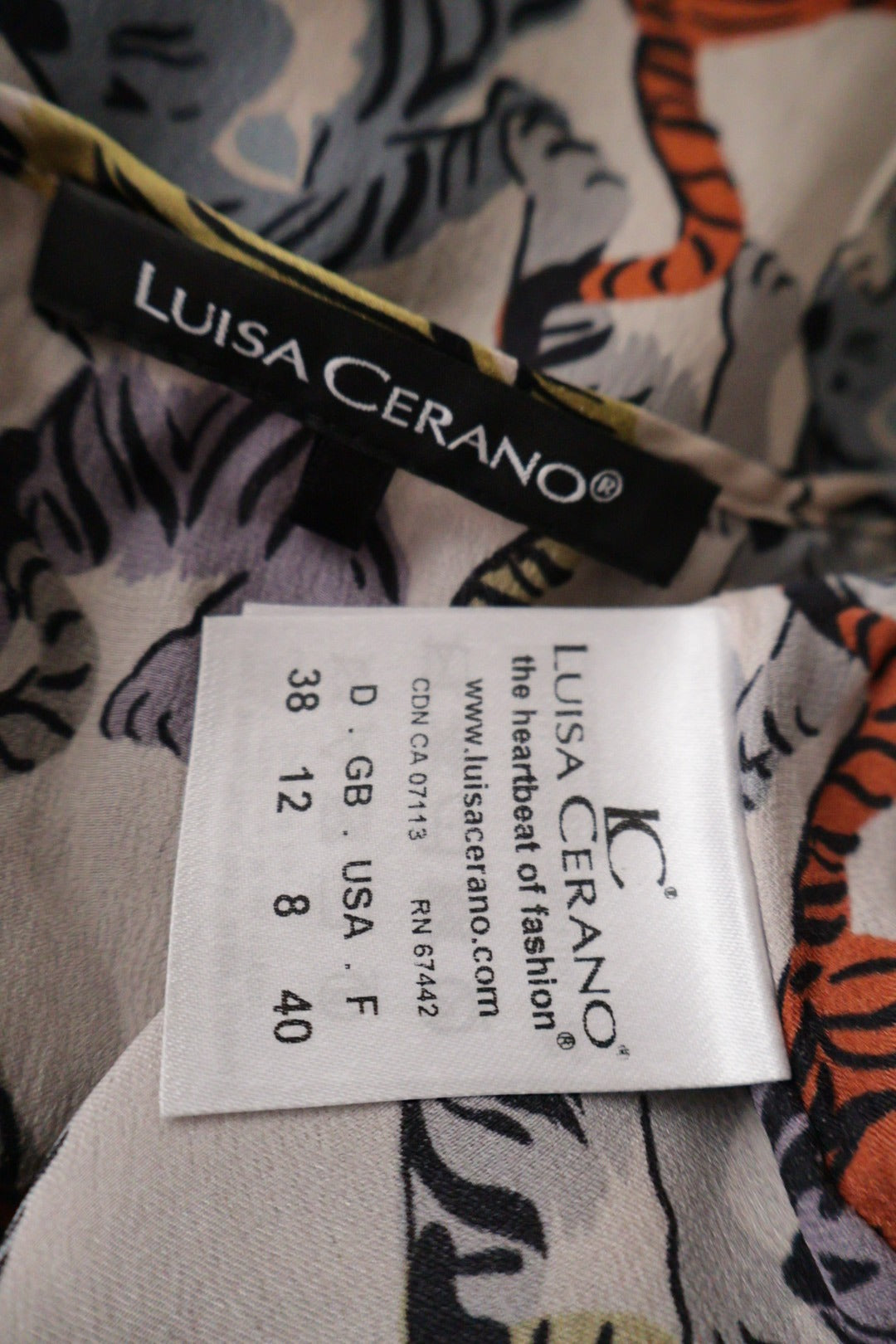 Bluza Luisa Cerano multicolor pe fond deschis mărime M etichetă mărime și compoziție second-hand premium