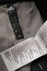 Pantaloni scurti adidas gri deschis mărime S etichetă mărime și compoziție second-hand premium