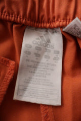 Pantaloni scurti Adidas portocaliu corai mărime M etichetă mărime și compoziție second-hand premium