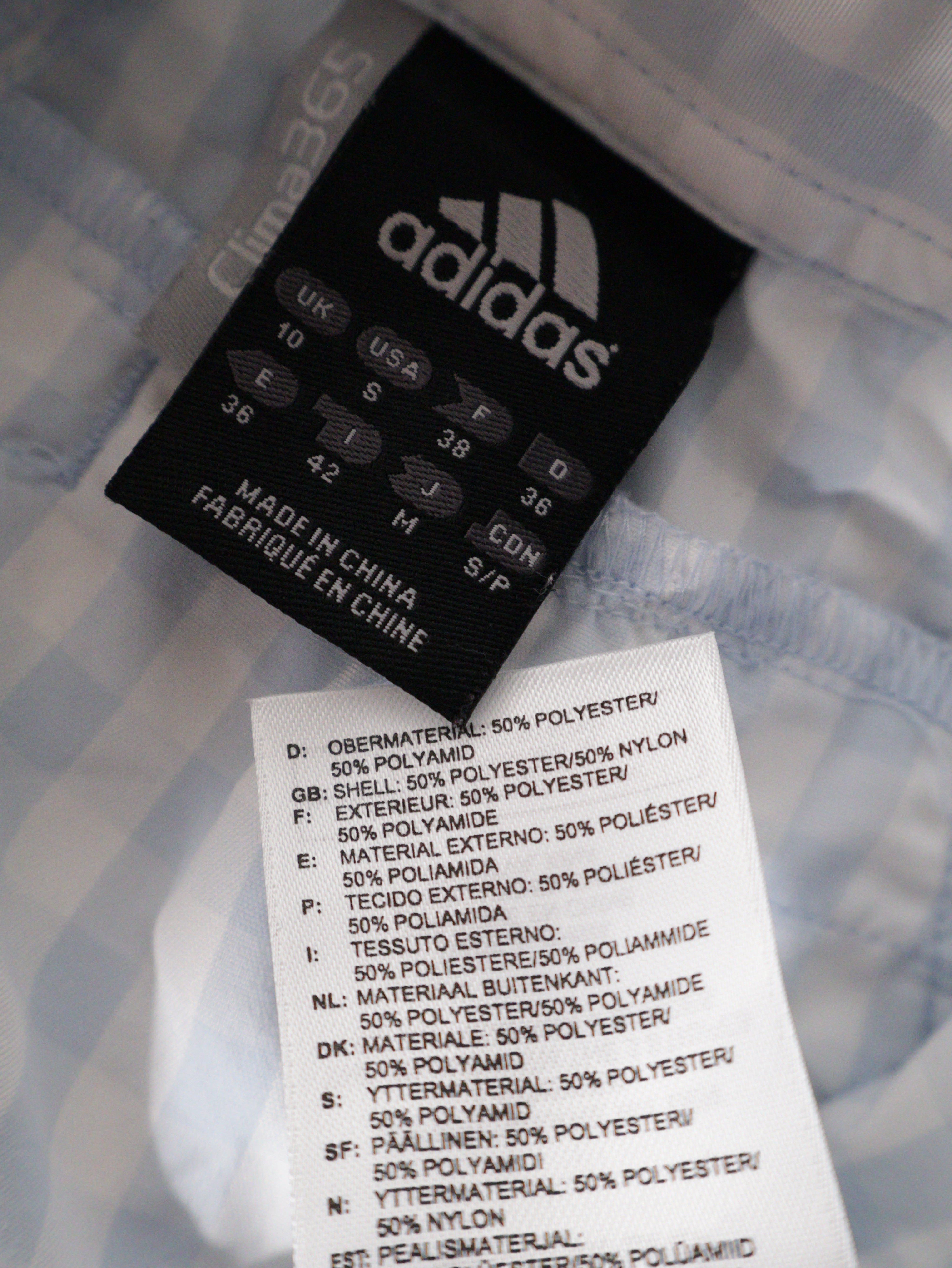 Eticheta marime si compozitie (rotita dreapta) - Cămașă adidas carouri bleu pastel – S – Femei