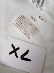 Eticheta marime si compozitie (rotita dreapta) - Tricou NIKE alb cu detalii bleumarin – M – Femei