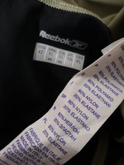 Eticheta marime si compozitie (rotita dreapta) - Maiou Reebok bicolor cu margini contrastante – XL – Femei