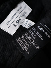 Eticheta marime si compozitie (rotita dreapta) - Pantaloni scurți Premium cu talie inalta si pliuri – M – Femei