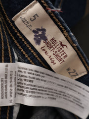 Eticheta marime si compozitie (rotita dreapta) - Blugi Hollister din denim cu mansete intoarse – S – Femei