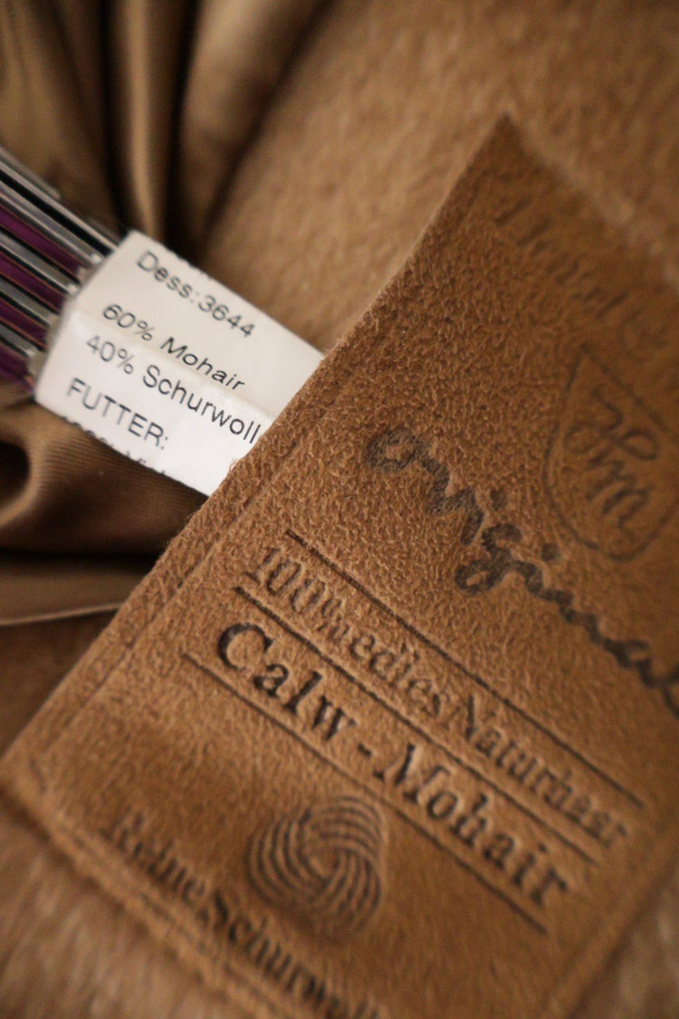 palton – etichetă – second-hand premium