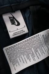 NIKE – pantaloni – etichetă – second-hand premium
